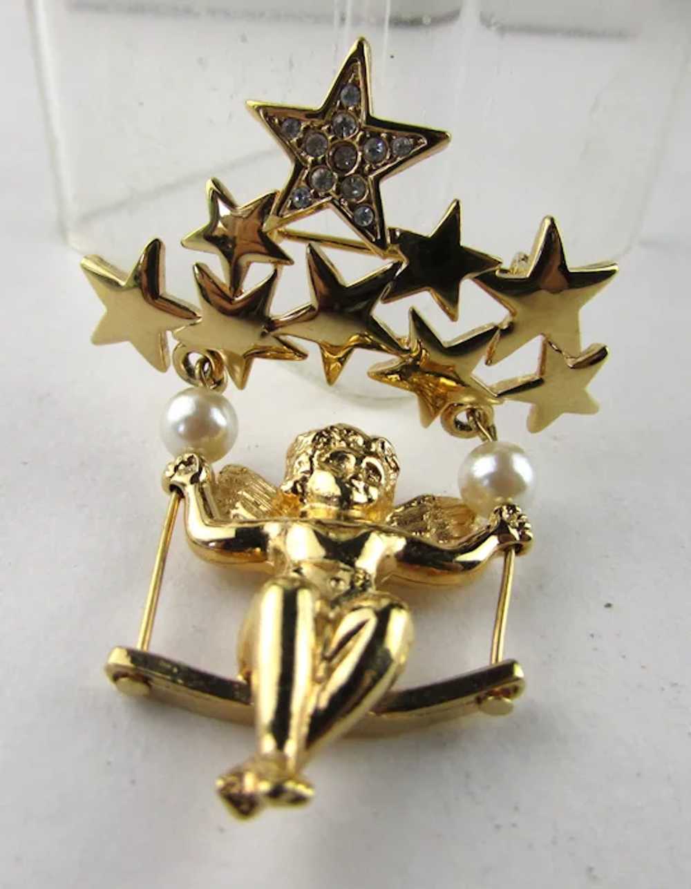 Cherub in Gold Tone Swinging On a Group of Stars - image 6