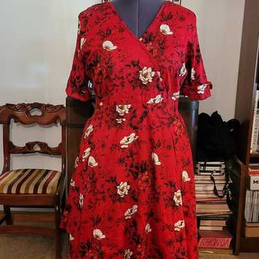 Lady Voluptuous red dress with white and red flowe