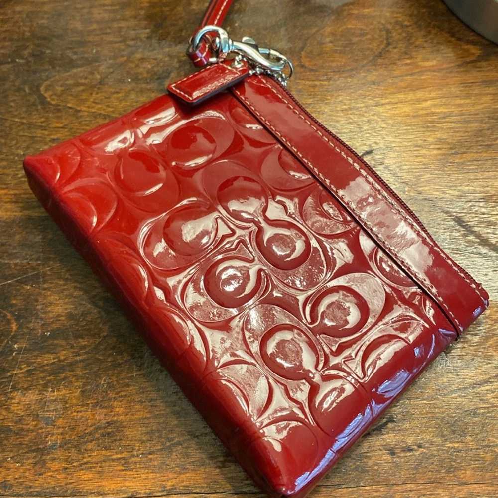 Coach red patent leather raised logo wristlet, EU… - image 1