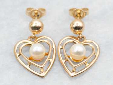 Polished Gold Heart and Pearl Drop Earrings - image 1
