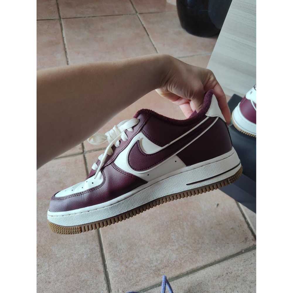 Nike Air Force 1 vegan leather low trainers - image 6