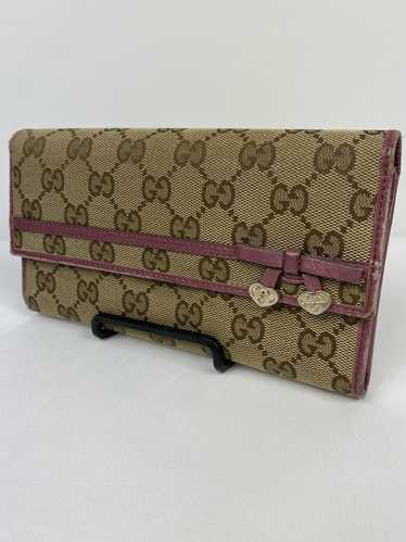 Gucci Gucci GG Canvas bowtie long wallet