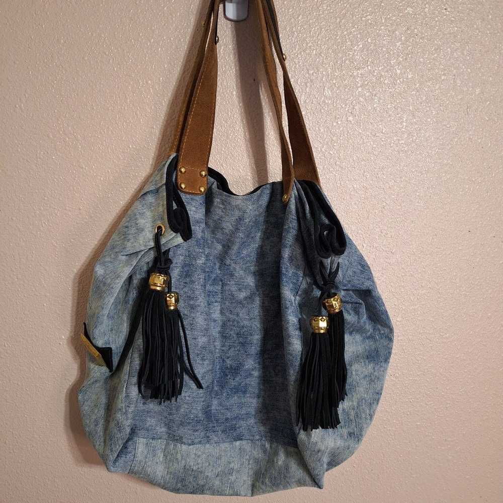 Stonewashed denim hobo bag with embroidered parrot - image 2