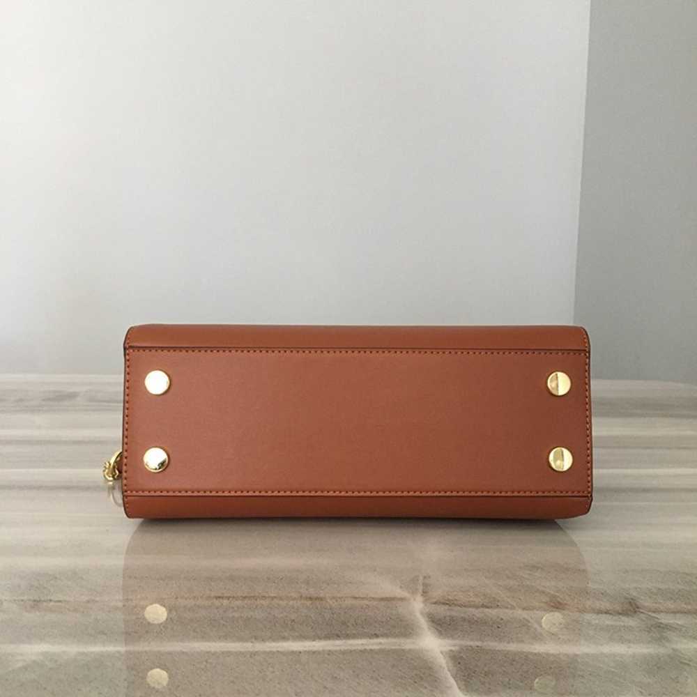 Compact and sophisticated, this Karlie leather cr… - image 4