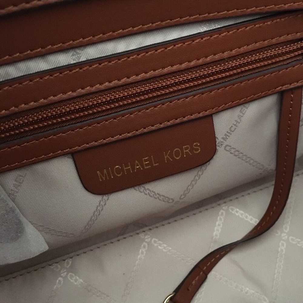 Compact and sophisticated, this Karlie leather cr… - image 8