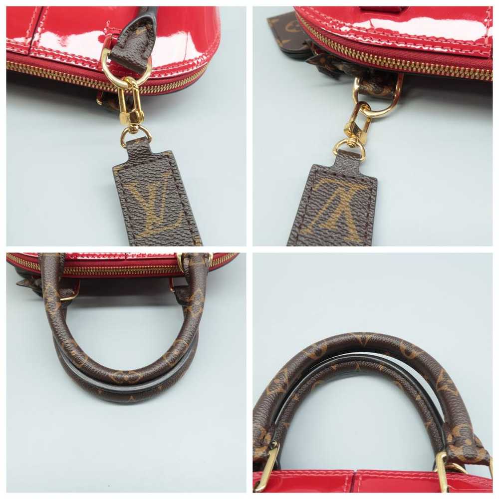 Louis Vuitton Alma patent leather satchel - image 10
