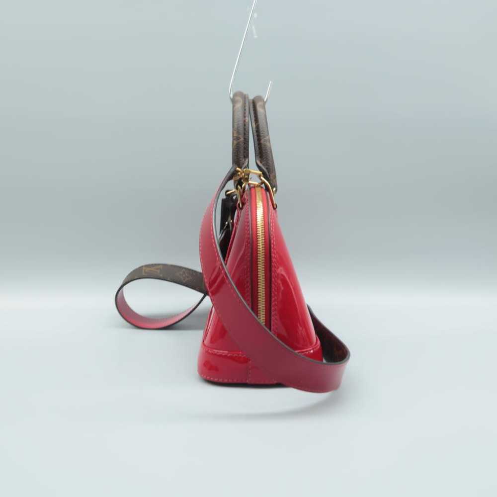 Louis Vuitton Alma patent leather satchel - image 2