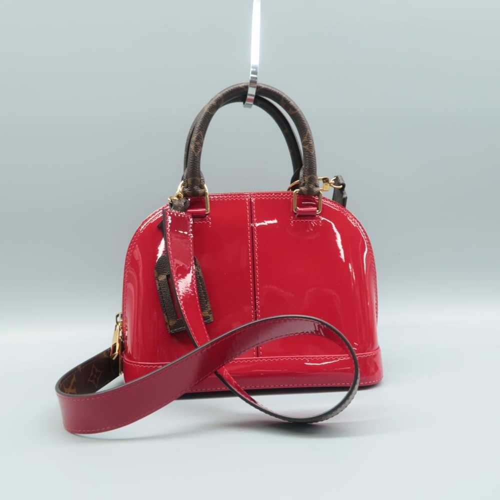 Louis Vuitton Alma patent leather satchel - image 4