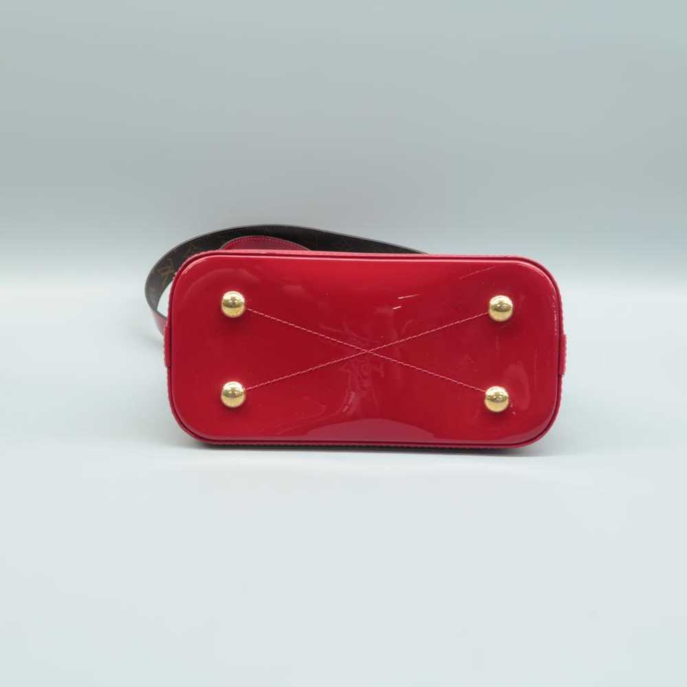 Louis Vuitton Alma patent leather satchel - image 6