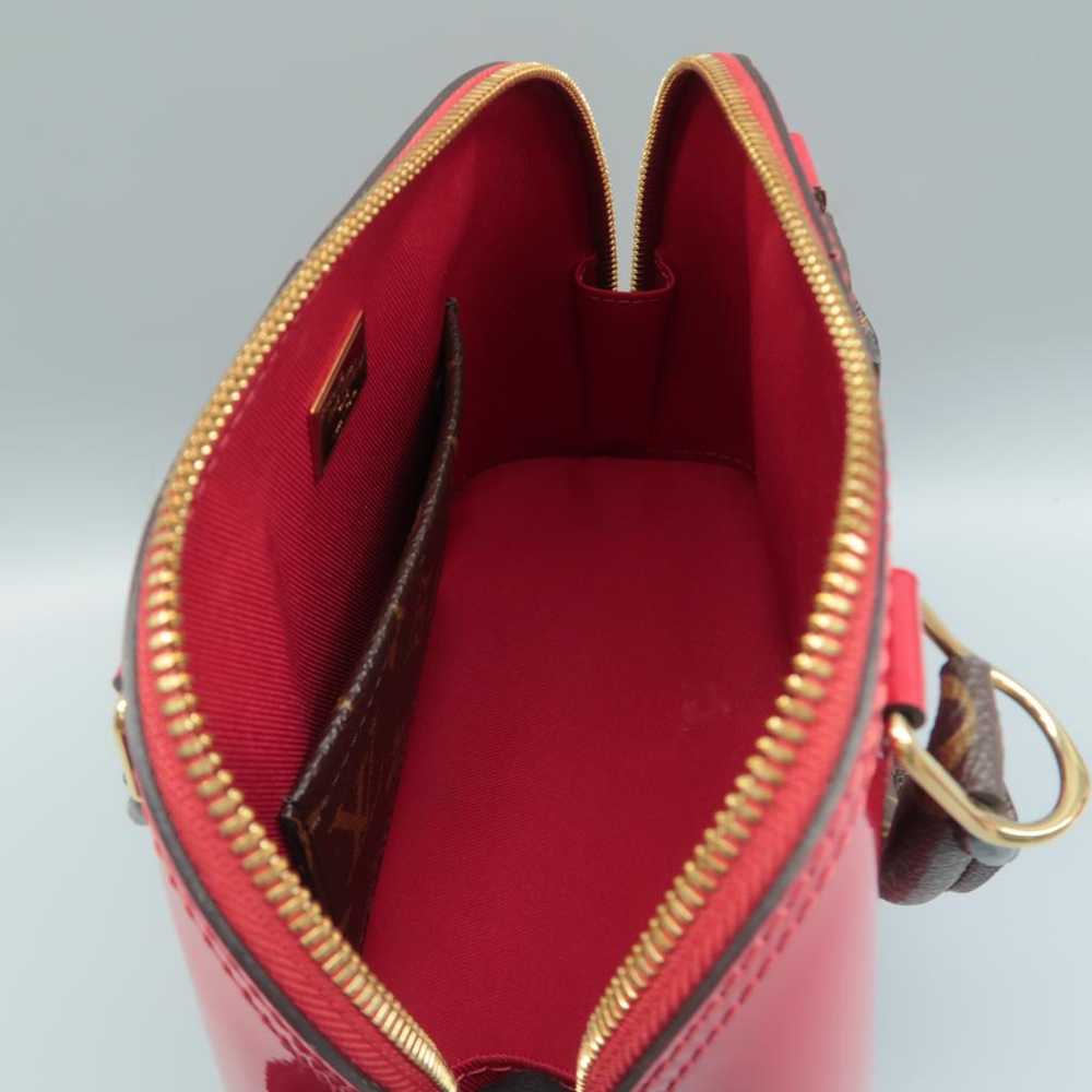 Louis Vuitton Alma patent leather satchel - image 7