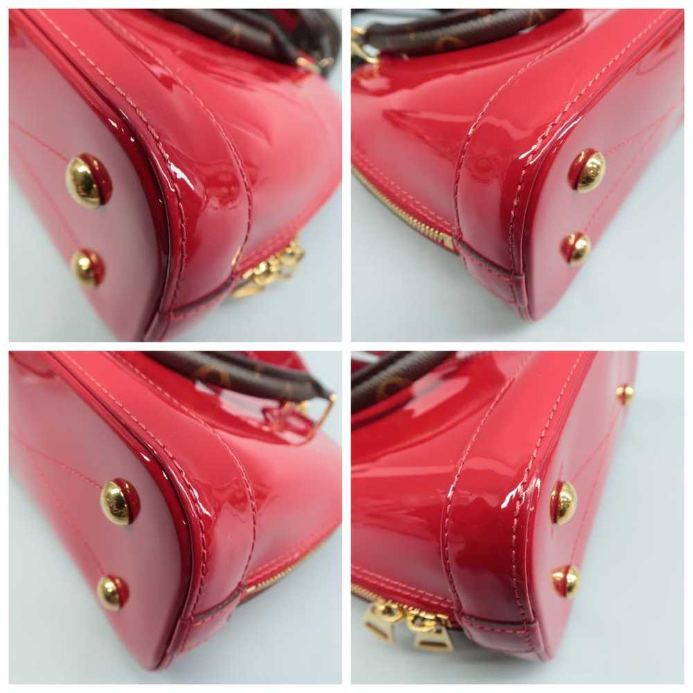 Louis Vuitton Alma patent leather satchel - image 9