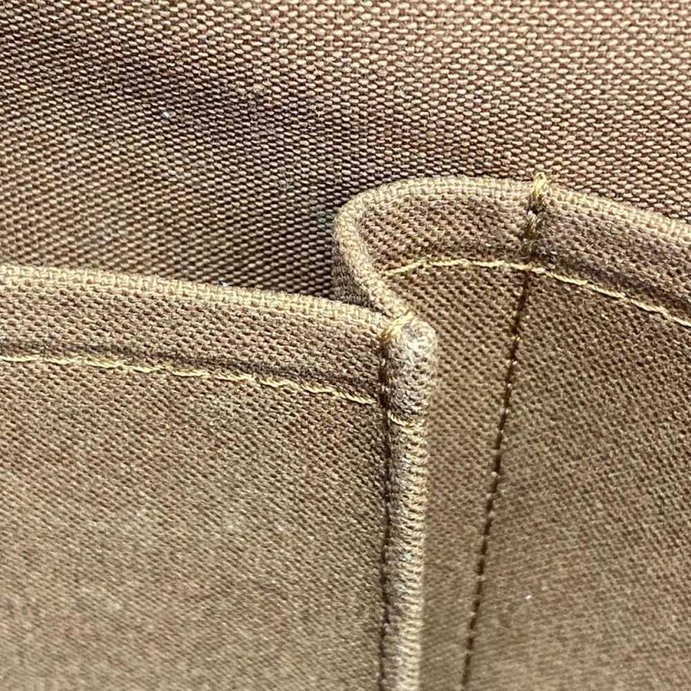 Louis Vuitton Bosphore cloth handbag - image 11