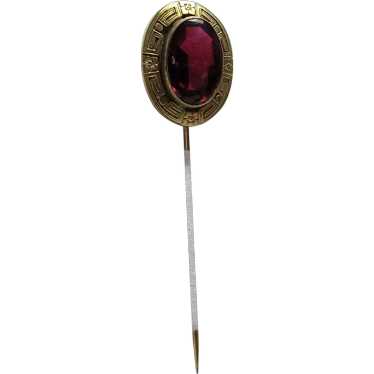 Brass stick pin with rhodlite garnet colored faux 