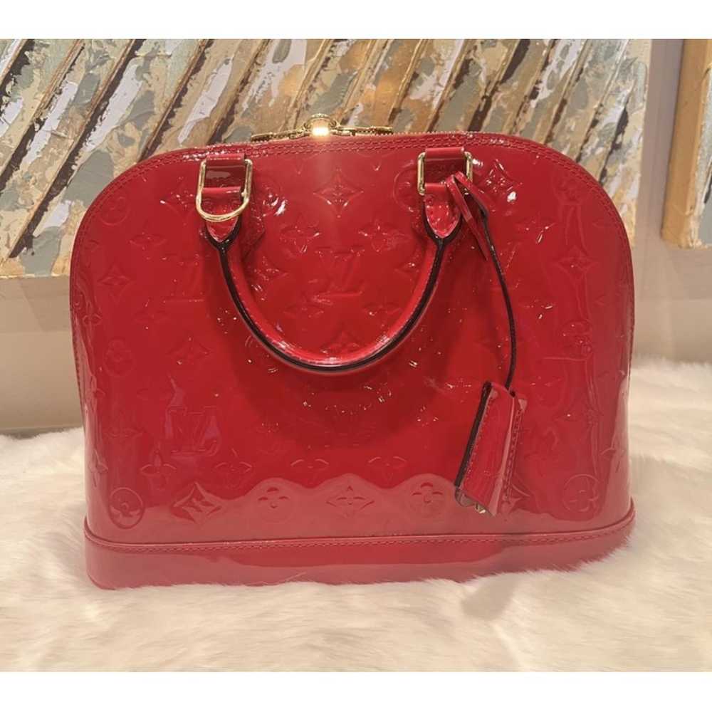 Louis Vuitton Alma patent leather handbag - image 9