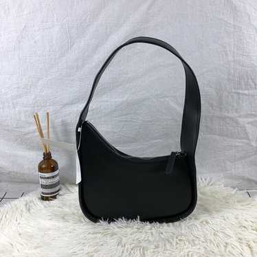 The Row Black Smooth Leather Half Moon Shoulder B… - image 1