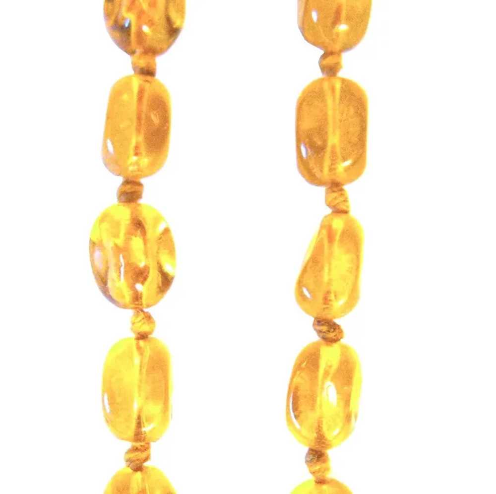 64 Inches Long Amber Glass Art Deco Necklace - image 3