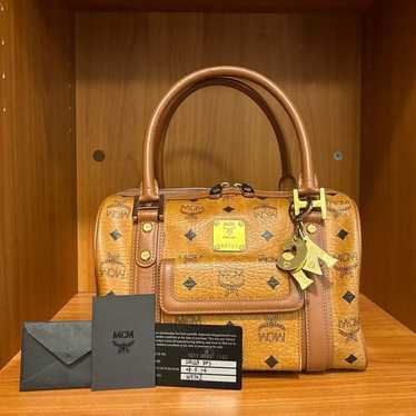 MCM Boston Cognac Leather Handbag with Bag Charm - image 1