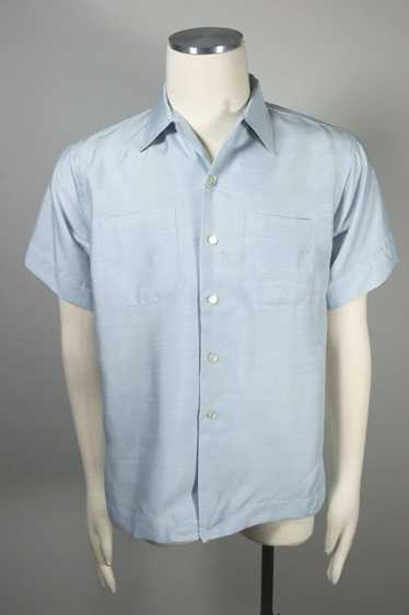 Blue Schiaparelli 1950s-60s short sleeve sport shi