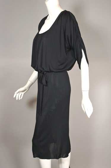 Becky Bisoulis 80s designer dress draped black jer