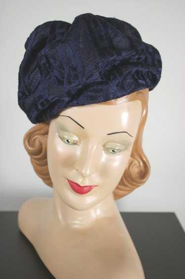 Navy fabric turban tilt hat 1950s-60s Hattie Carne