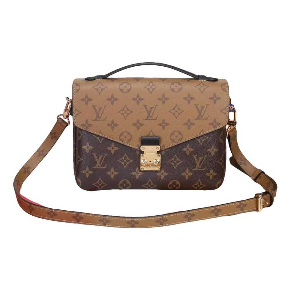 Louis Vuitton Metis cloth clutch bag - image 1