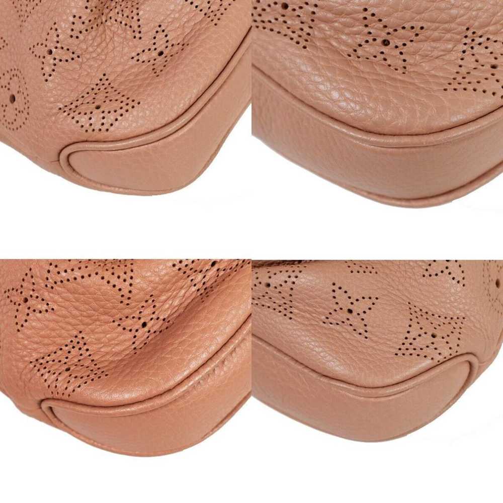 Louis Vuitton Madeleine leather handbag - image 10