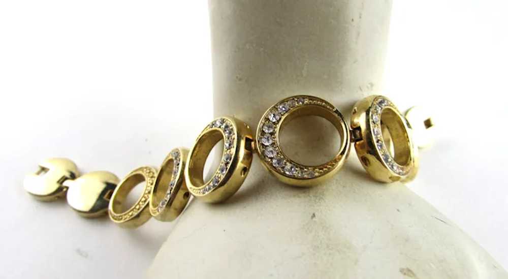 Gold Tone Circle Bracelet With Crystal Accents - image 2