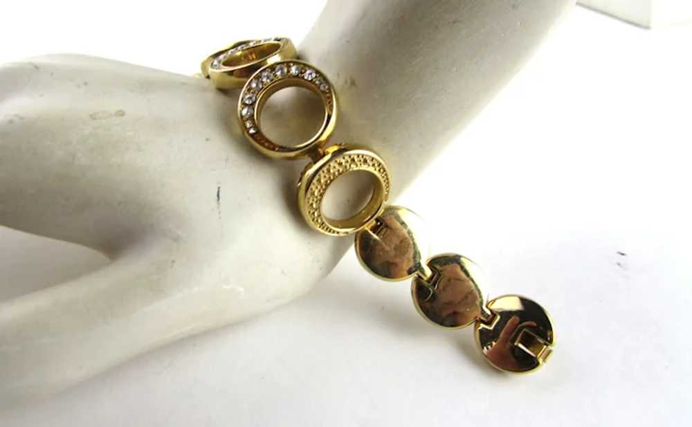 Gold Tone Circle Bracelet With Crystal Accents - image 3