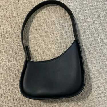 The Row half moon bag in black