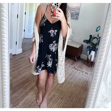 New floral flowy caged open back flirty swing dres