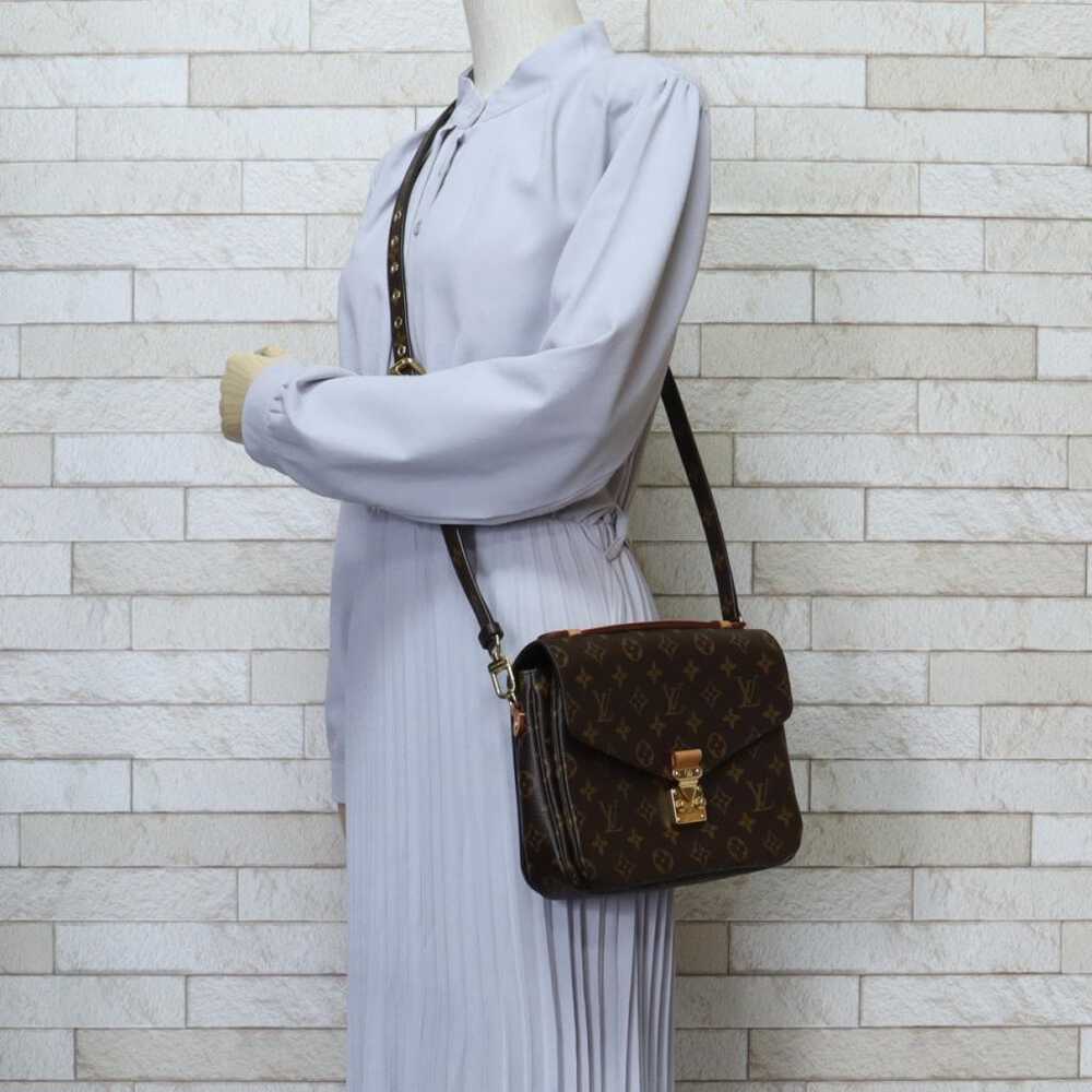 Louis Vuitton Metis cloth handbag - image 2