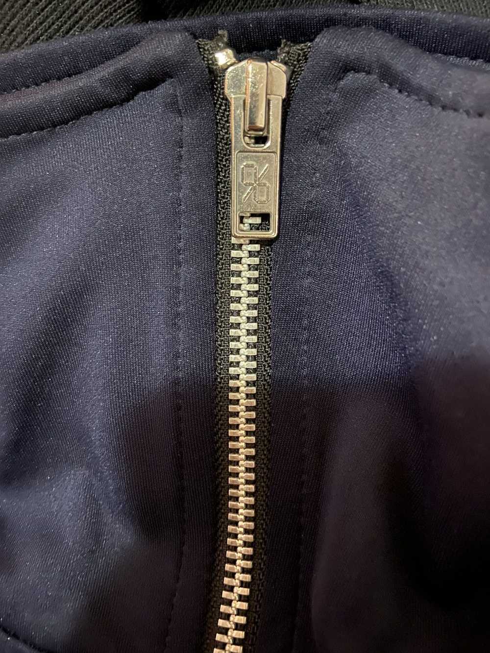 99%Is navy and black zip track jacket - image 6