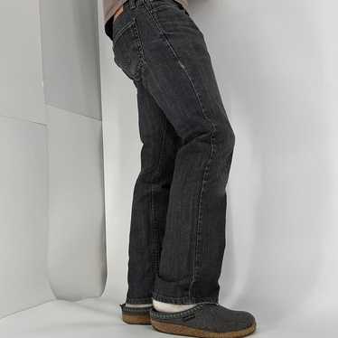 Y2K Levi’s Black 514 Straight Jeans.  Faded fit m… - image 1