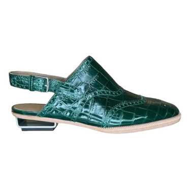 Hermès Crocodile mules & clogs