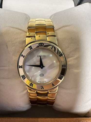 Gucci 18K plated GUCCI watch with mother of pearl 