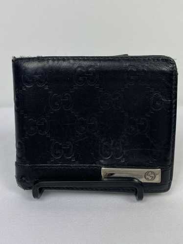 Gucci GG monogram leather bifold wallet