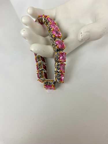 Square pink diamond cut in a beautiful frame brace