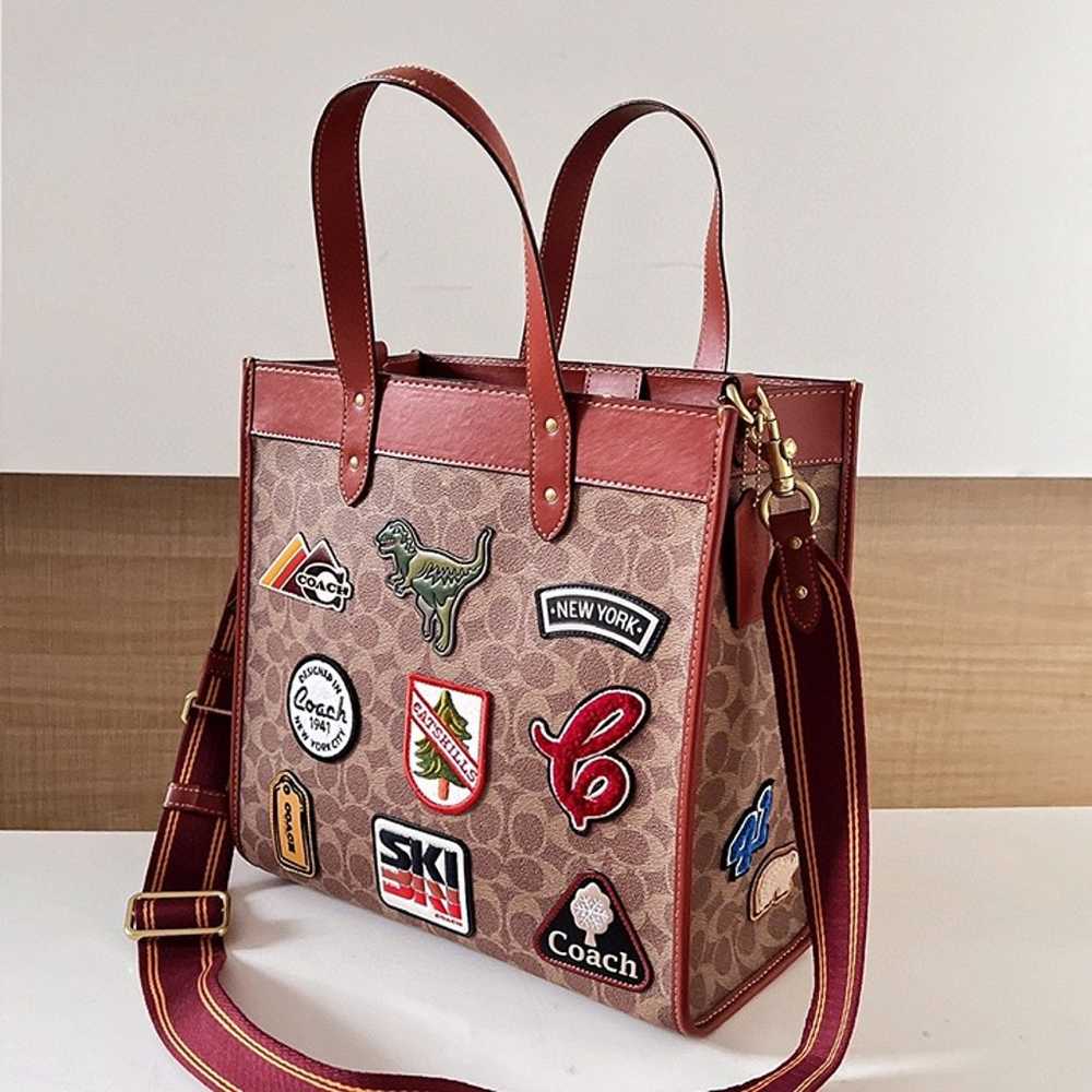 Field Tote In Signature Canvas With Patches - image 1