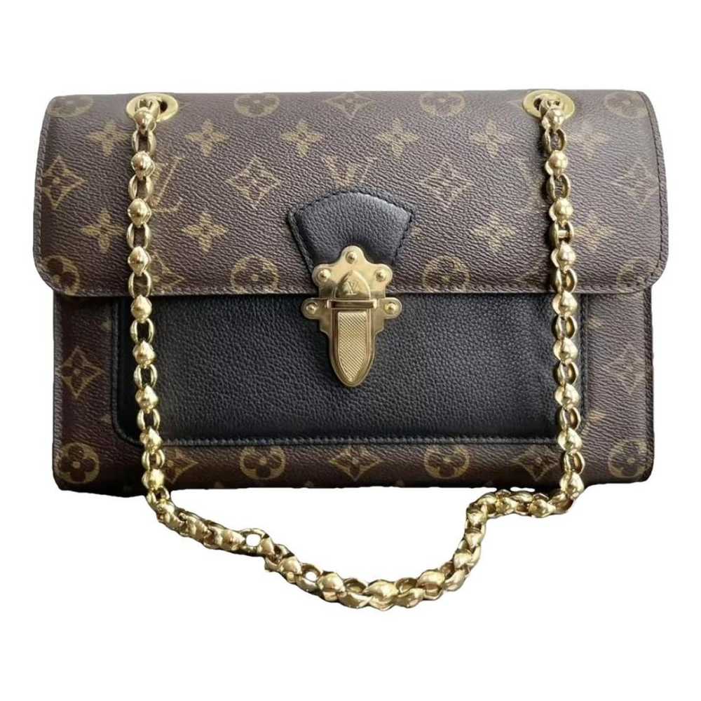 Louis Vuitton Victoire leather handbag - image 1