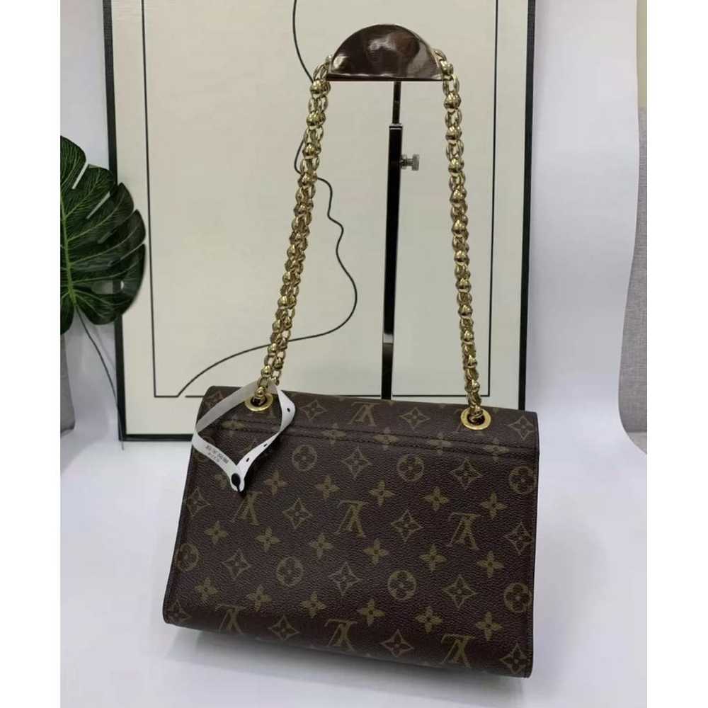 Louis Vuitton Victoire leather handbag - image 3