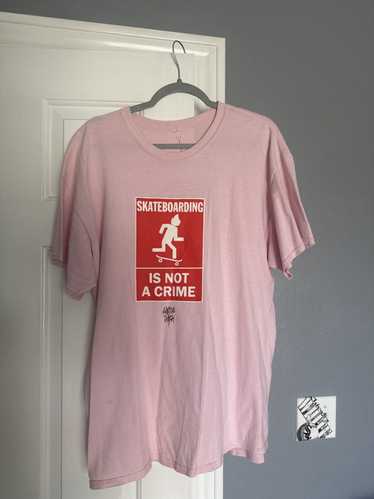 Travis Scott Skateboarding is not a crime tee