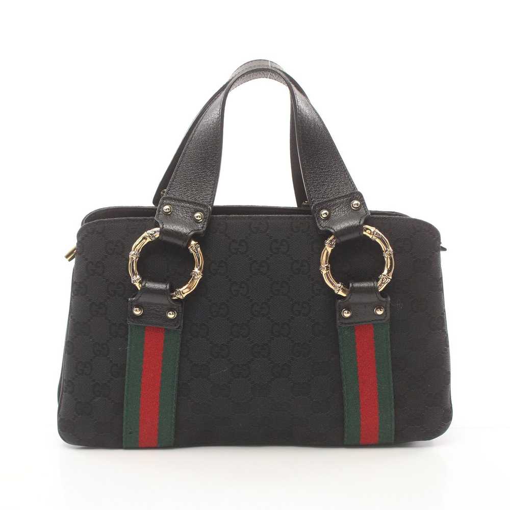 Gucci Gucci Gg Canvas Metal Bamboo Handbag Leathe… - image 1