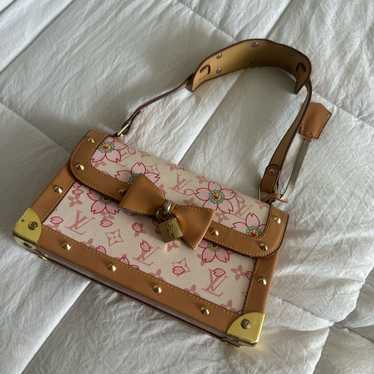 Pink floral purse with studded design. small signs