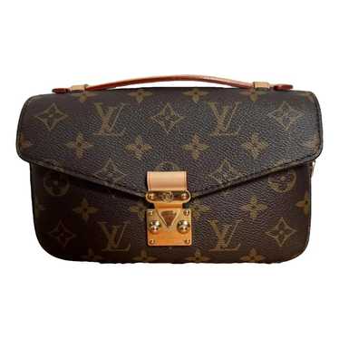 Louis Vuitton Metis patent leather clutch bag