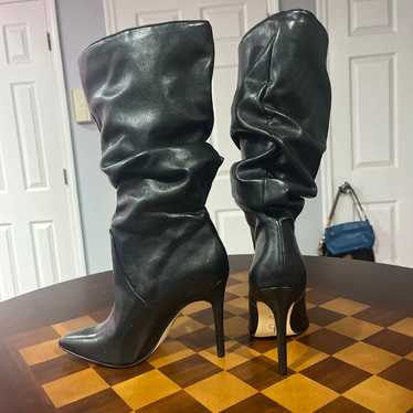 High heel black boots, leather