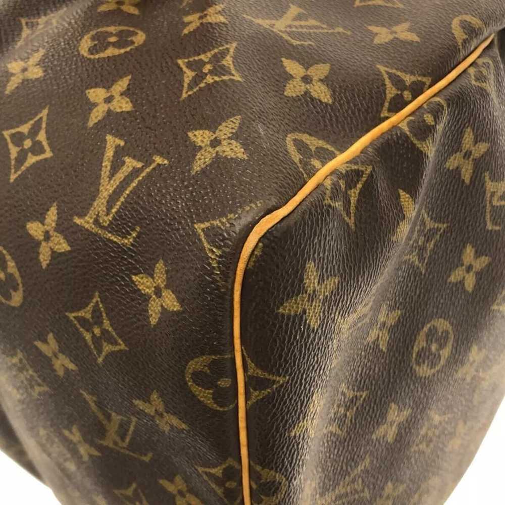 Louis Vuitton Leather travel bag - image 11