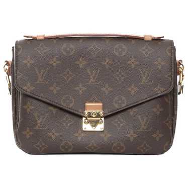 Louis Vuitton Metis cloth handbag