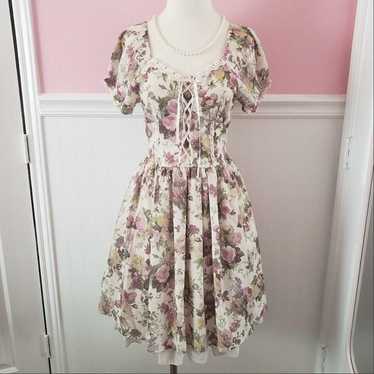 Axes Femme floral dress with a lace-up ribbon