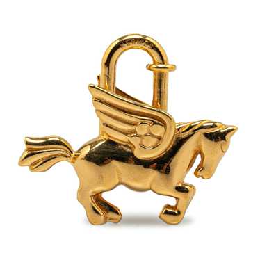 Gold Hermès Pegasus Cadena Lock Charm