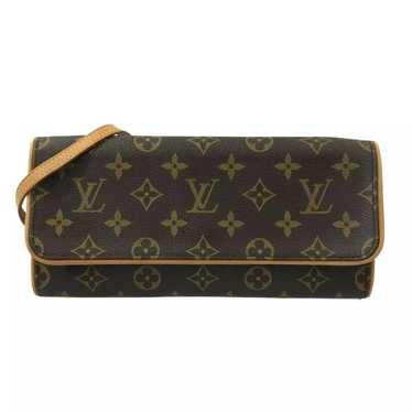 Louis Vuitton Eva leather clutch bag